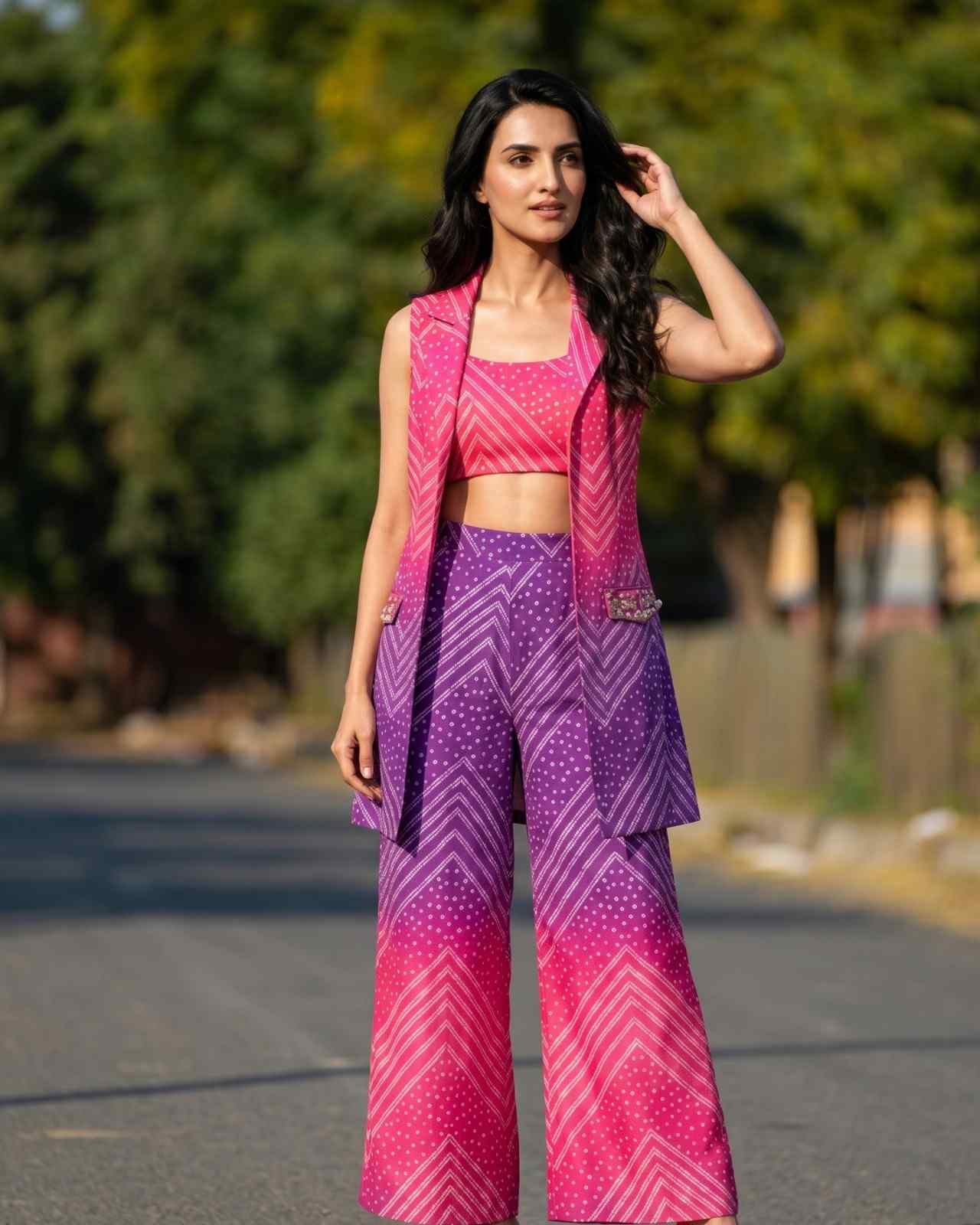 Trishika Vaidya posing in the structured sleeveless vest of the blue and beige linen co ord set by Uptownie for KapdeWali